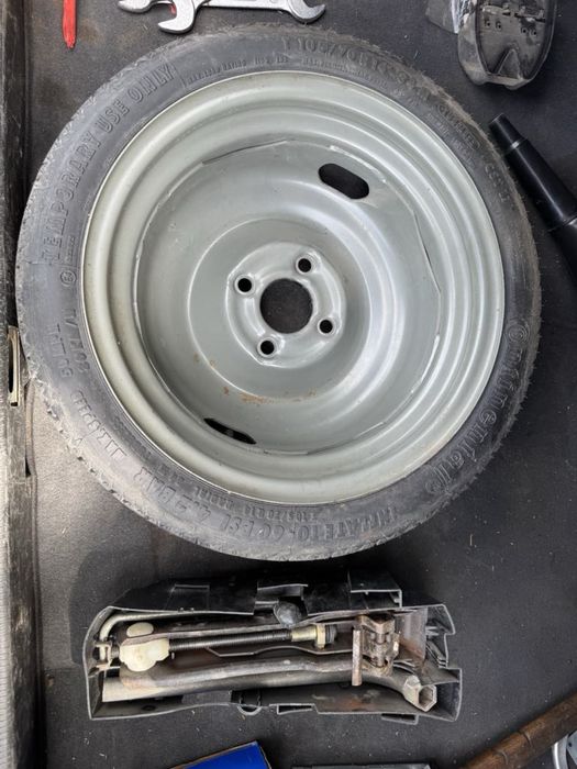 Резервна гума Ww poli 105.70.14 с крик ключ кука като нова Continental