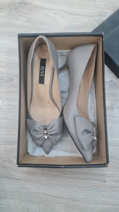 Туфли на каблуке.