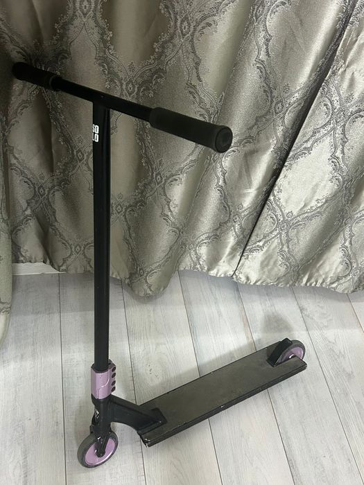 Самокат  трюковой