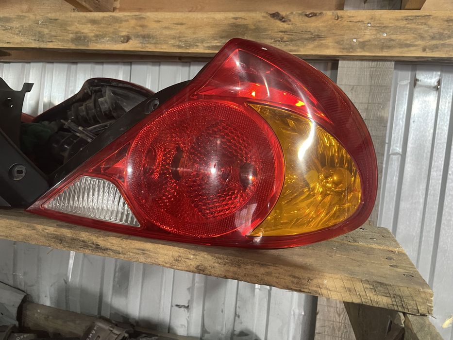 Кия Спектра задний фонарь