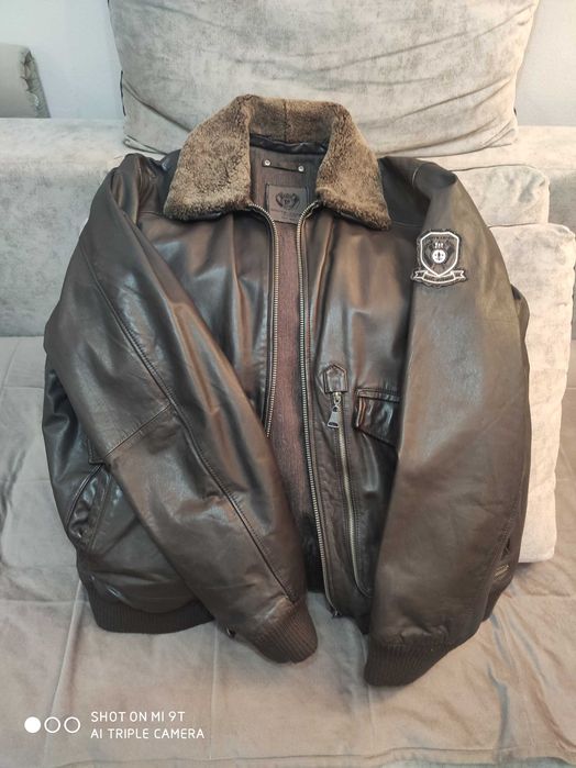 Куртка кожаная с меховым воротником