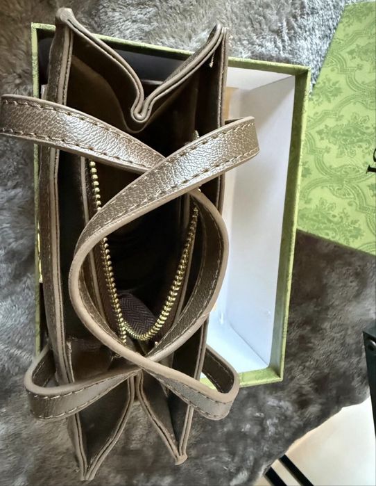 O copie perfecta de Geanta Gucci  cu palarie de vara