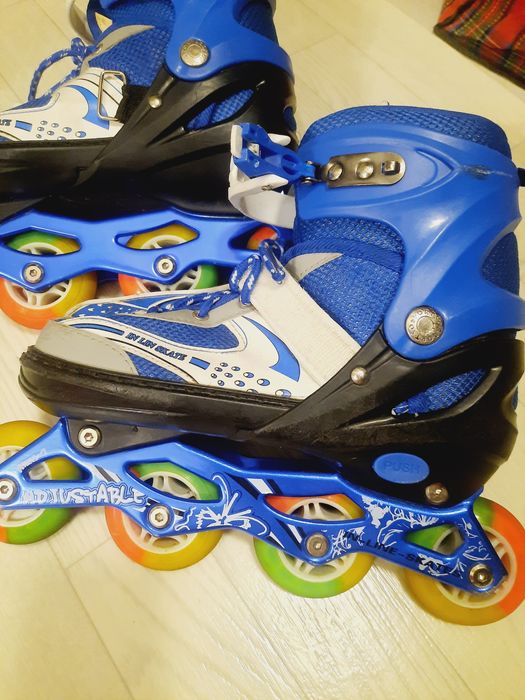 Роликовые коньки