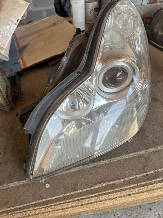 Mercedes Cls 04-10г ляв фар ОРИГИНАЛ