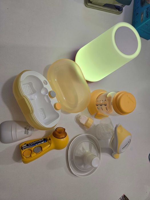 Pompa manuala Medela + lampa de veghe + pila unghii copii