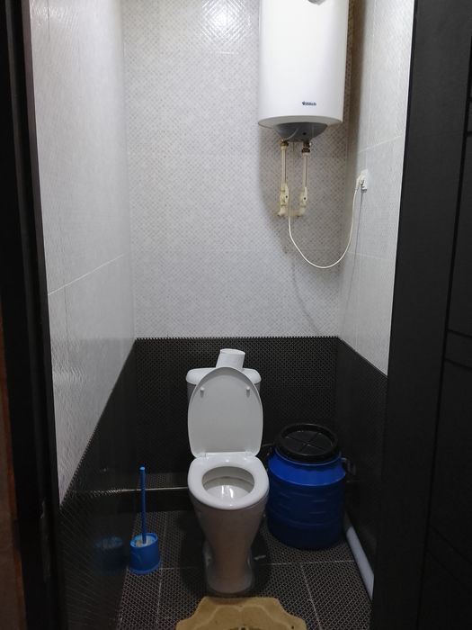 Дом который находится заде автосалона Шевролет,Зарафшан дома Навоий38Б