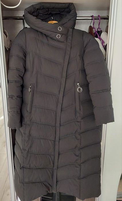 Продам женский пуховик.