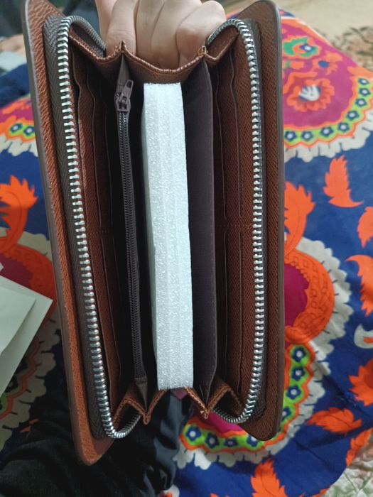 Erkaklar hamyoni yengi