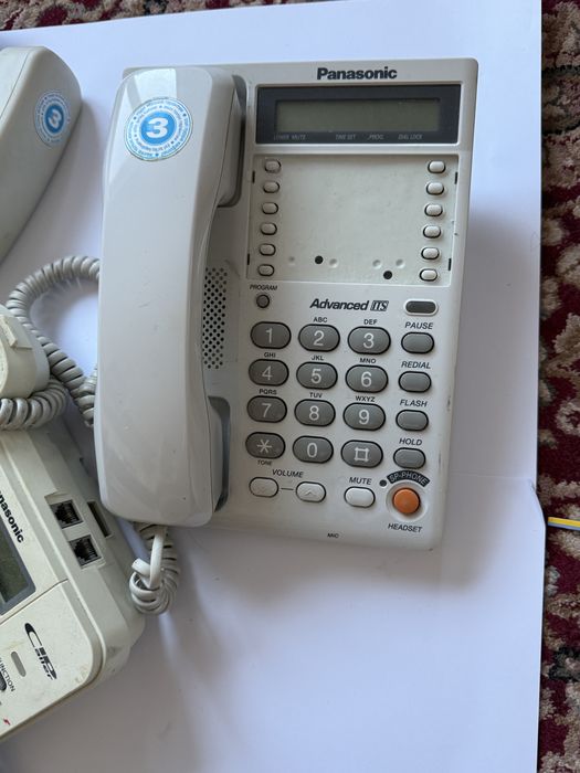 Комплект  домашних телефонов Panasonic и Philips