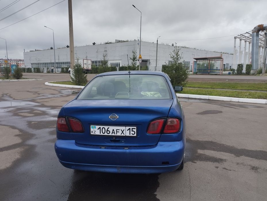 Ниссан примера р11