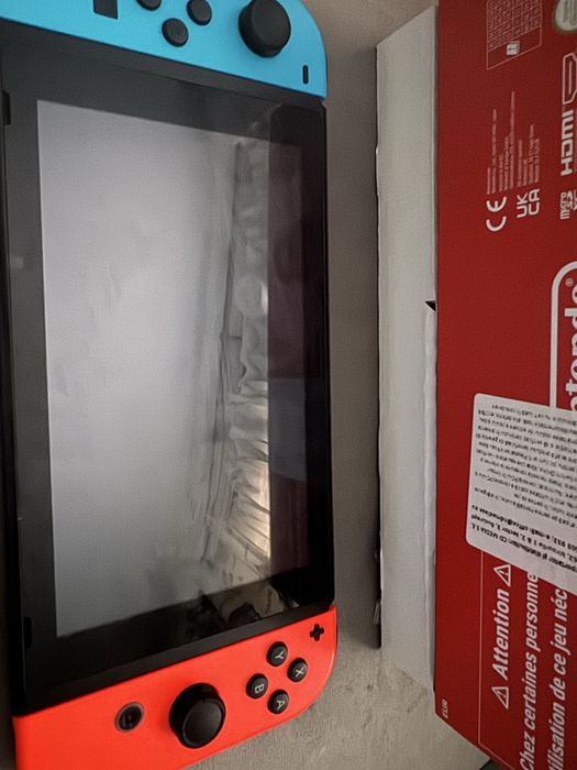 Nintendo Switch ( utilizat de maxim zece ori)