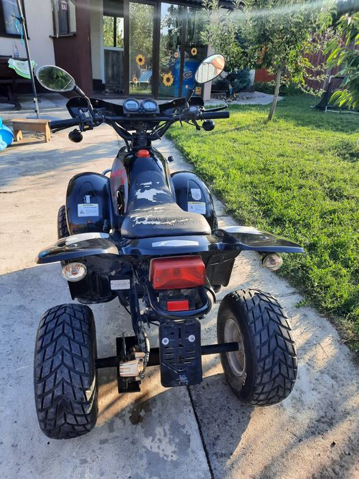 Vand ATV DEFENDER 50 impecabil la SUPER PRET!