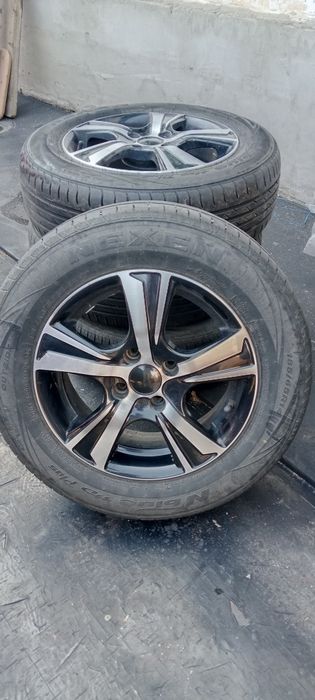 Продам литые диски с летними шинами