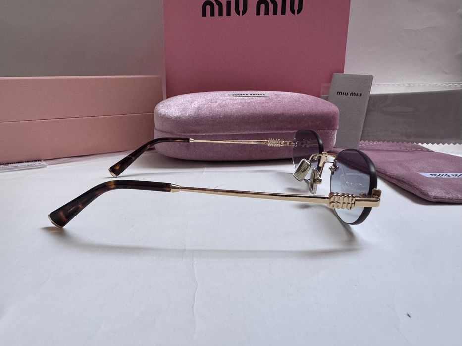 Ochelari de soare Miu Miu Oval-Rimless SMUA54 51-20 140, Noi