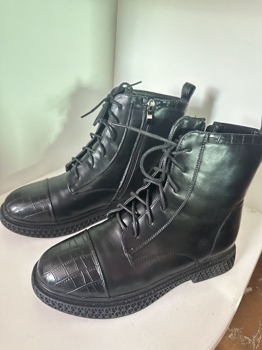 Продам новые зимние ботинки