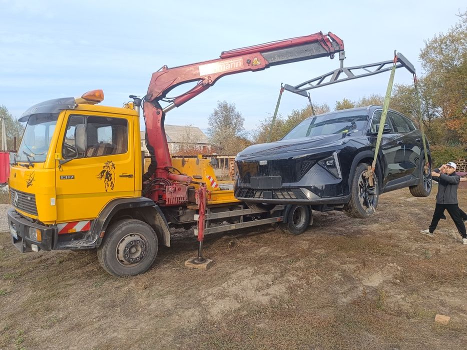 Эвакуатор  ,Манипулятор   два в одном с сьежяющи платформы