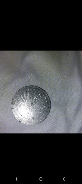 Продам монету тенге