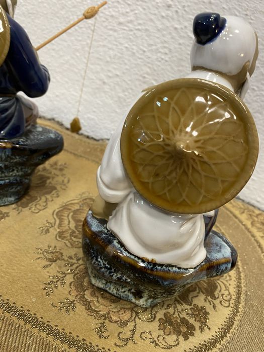 Стари азиятски фигури рибари