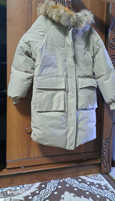 Женский куртка сифати яхши.Фирминни