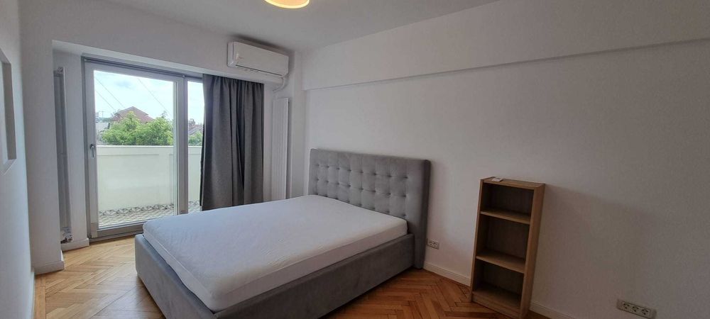 Inchiriez ap. doua camere  Pta. Unirii (2 min metrou)