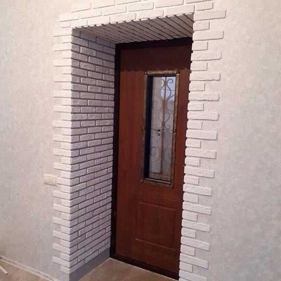 Отделка проемов декоративным камнем фото Отделка проемов декоративным камнем фото