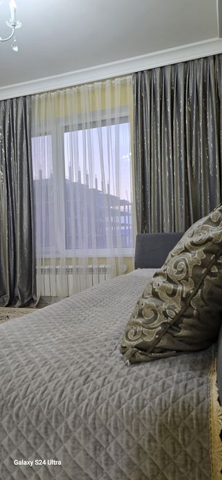 По часам апартаменты в Талане