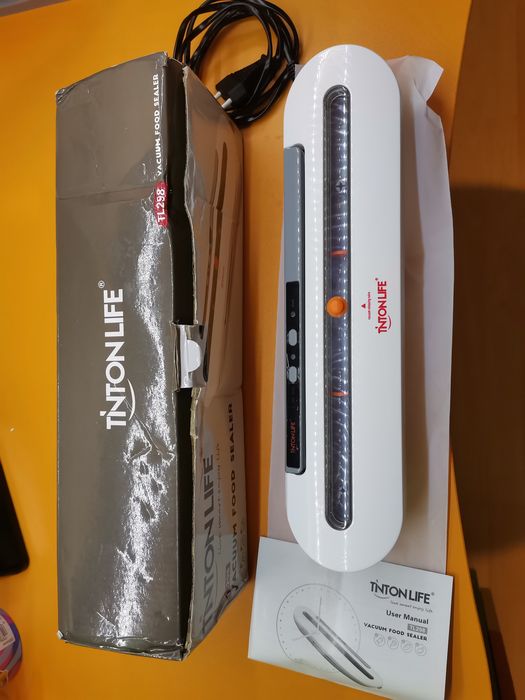 Вакуум машинка TINTONLIFE
