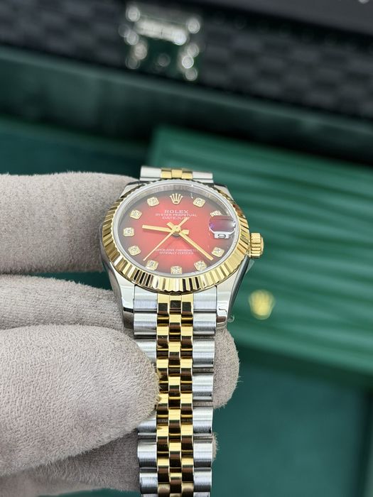 Rolex Datejust 31 Yellow Rolesor – Red Diamond Dial Jubilee