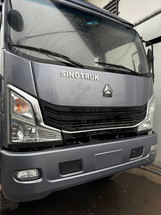 Бортавая автоплатформа с тентом Sinotruk Homan-H3  4x4  9 тн