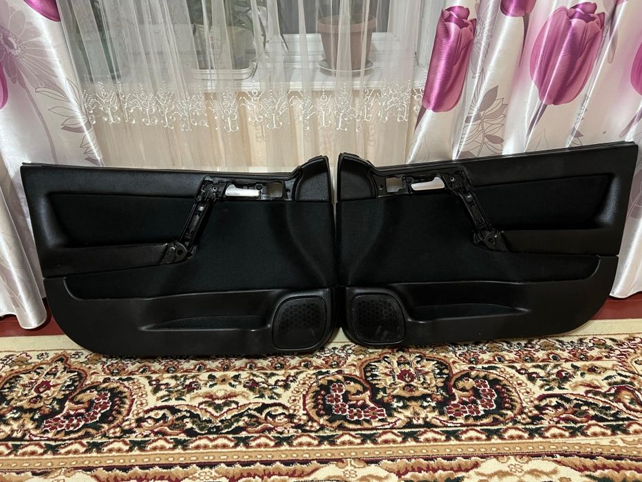 Дверные обшивки на Опель Астра Джи