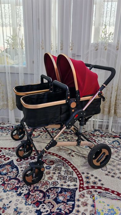 Продам двойную коляску для близнецов