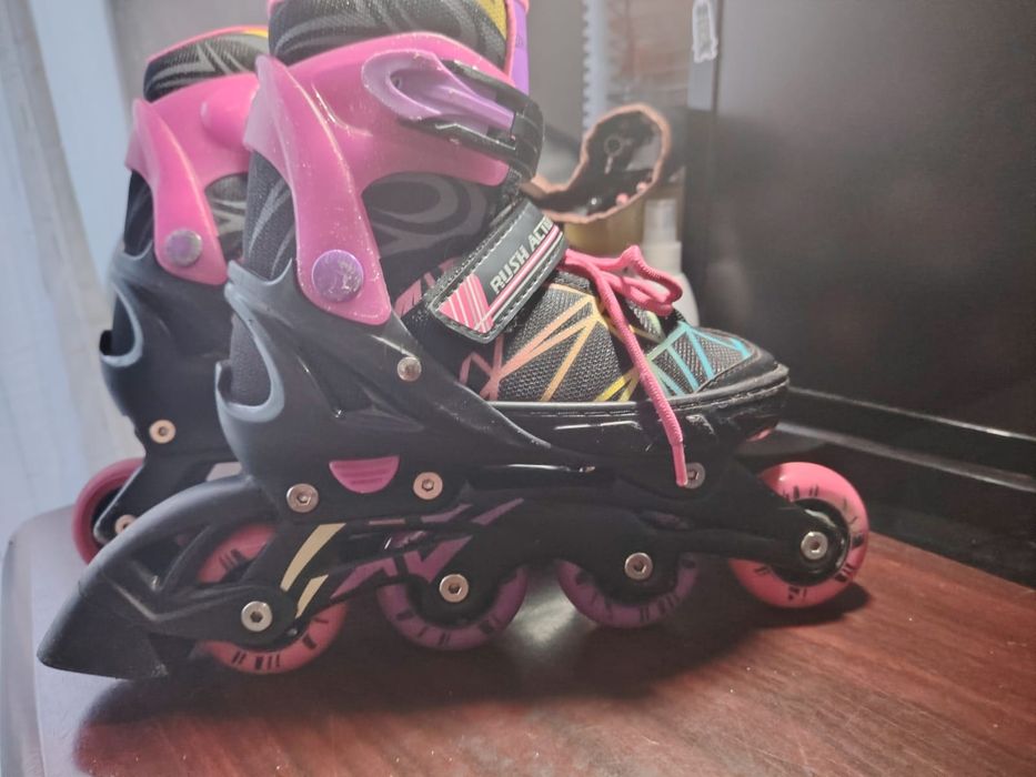 Роликовые коньки продам