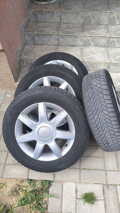 Set jante aliaj pe 15 cu anvelope de iarna