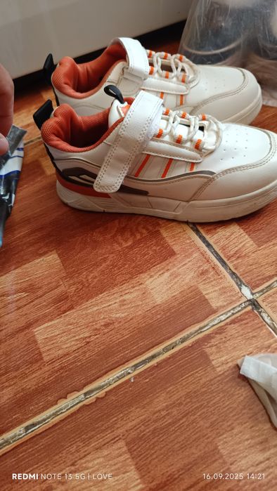 Аяқ киім келісімен