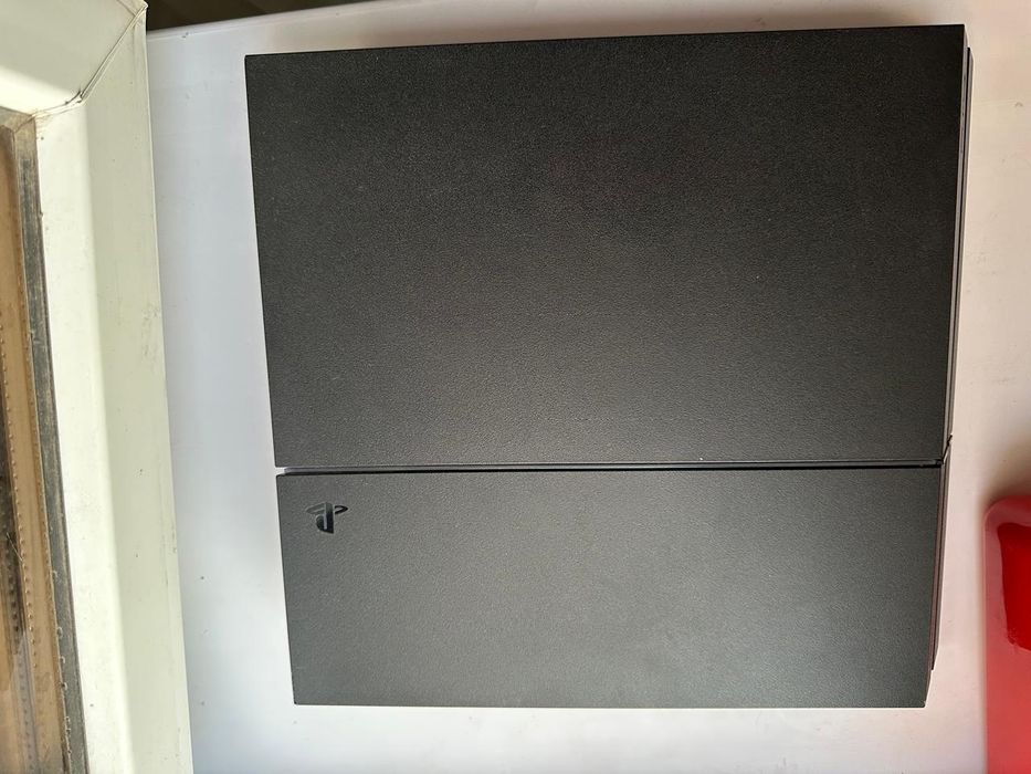 Продам Sony PS 4 (Fat)