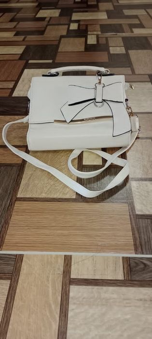 Женская сумка сотилади