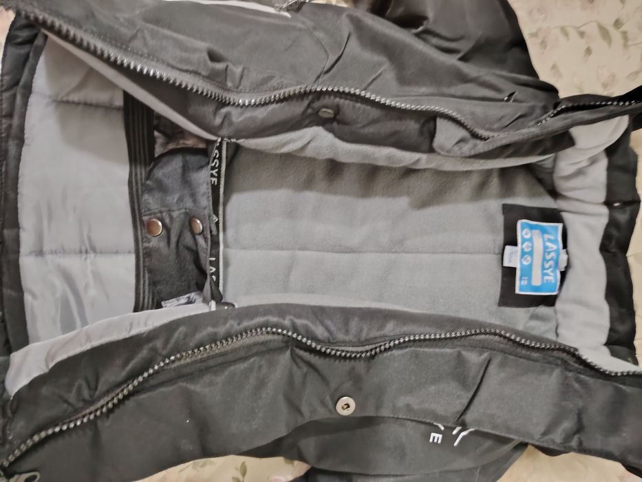 Продам новый  зимний комбинезон