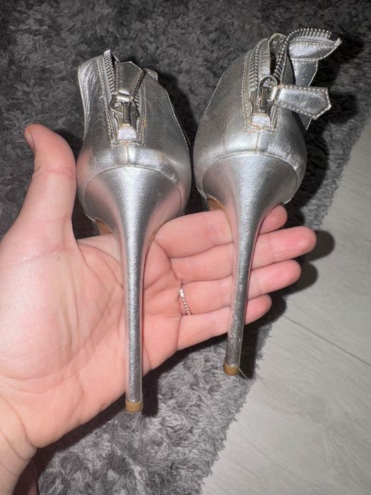 Prada scalloped silver metallic leather heels.