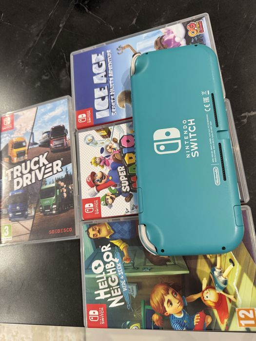 Consola Nintendo Switch Lite (pachet 4 jocuri)