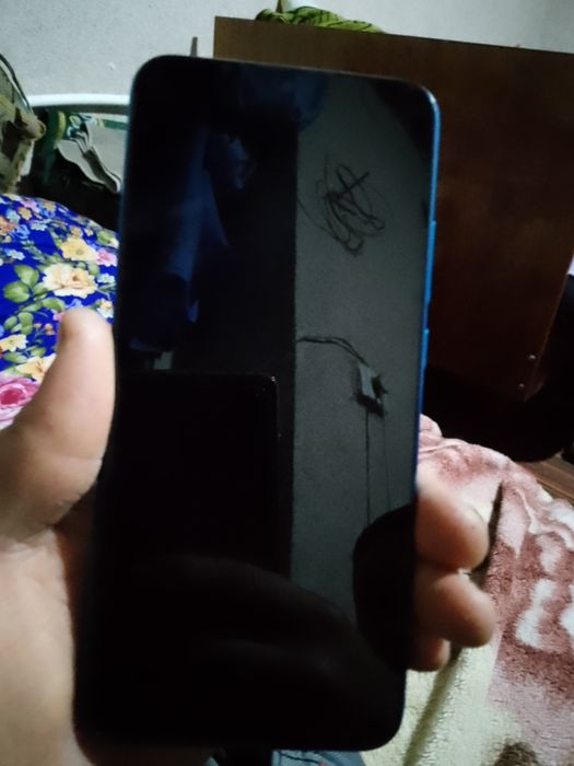 Redmi 9 xotirasi 32  kamera 13 mp  rangi koʻk  ime qilingan