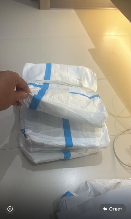 Одноразовый комбинезон оптом