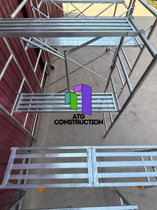 Строительные леса складные оцинкованные комплект с настилом и колесами