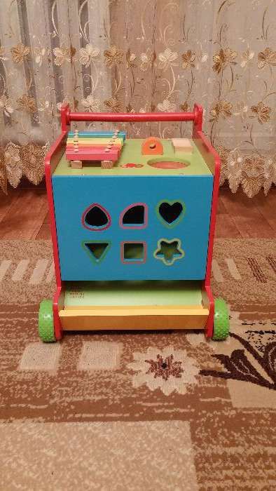 Развивающая игрушка-каталка