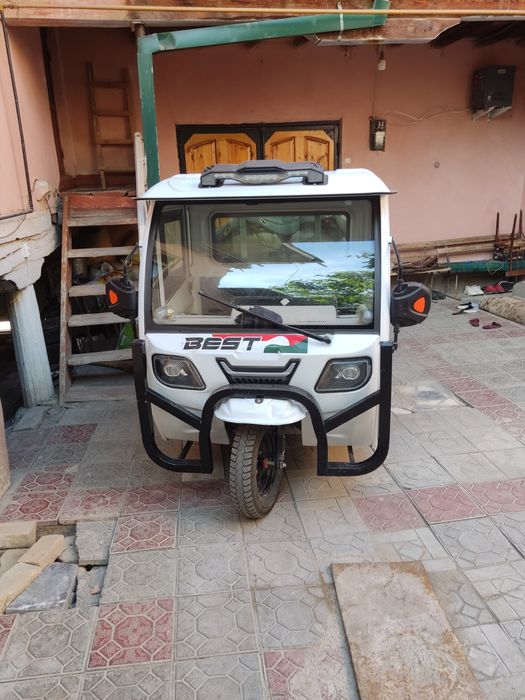 Электронный мотоцикл янги