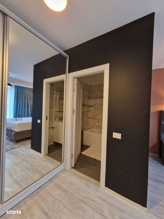 Apartament 74 mp, 2 bai, mobilat complet la 1.547 €/mp. Te muti d