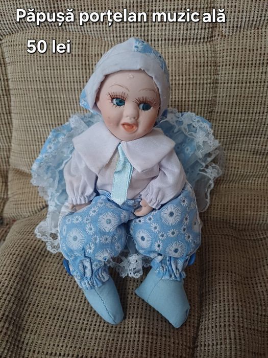 Păpuși porțelan muzicale