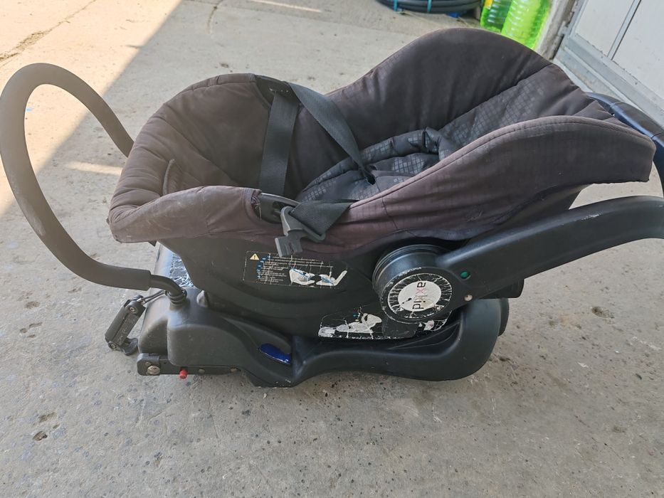 Scaun auto Axkid pentru bebeluși, cu bază ISOFIX  stare utilizat