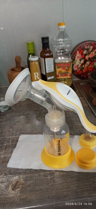 Молокоотсос Medela