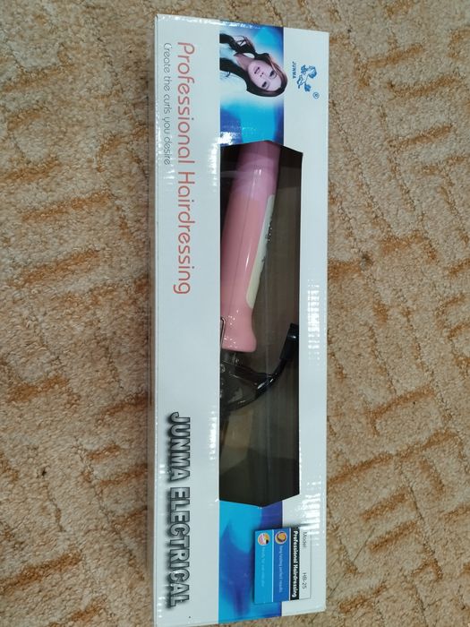 Выпрямитель для волос Новый.