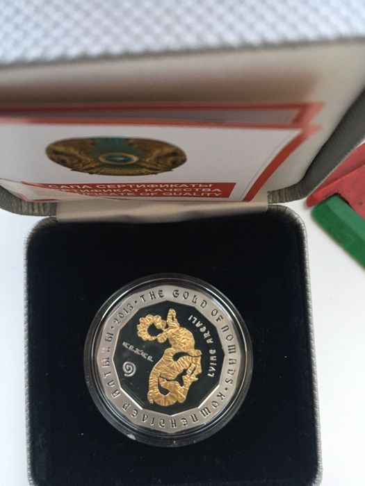 Монета серебреная с позолотом